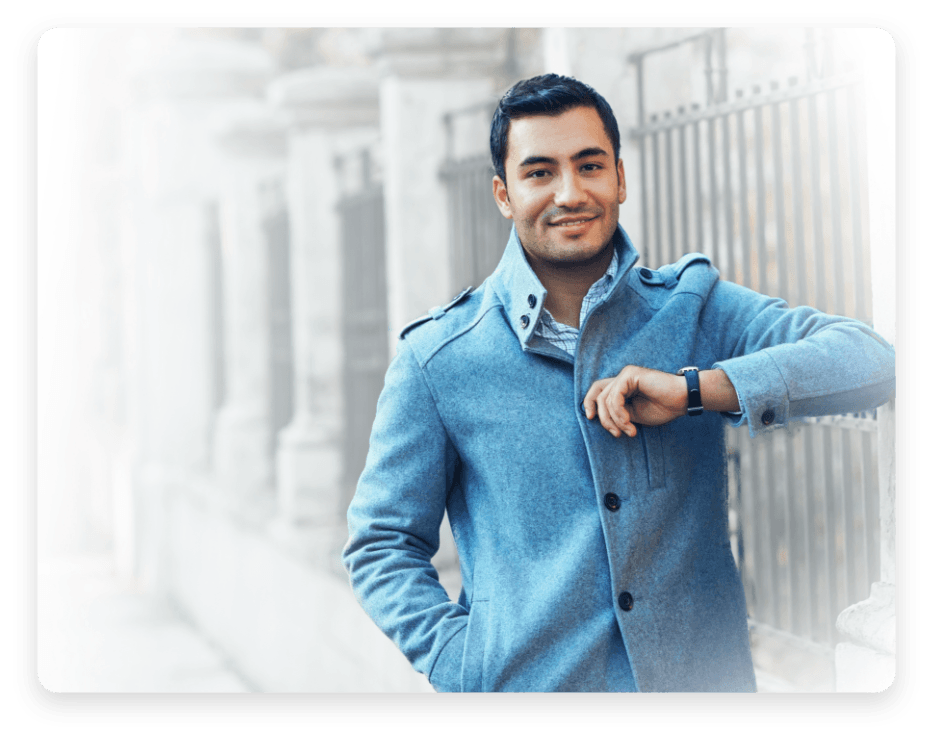 Man leaning against fence